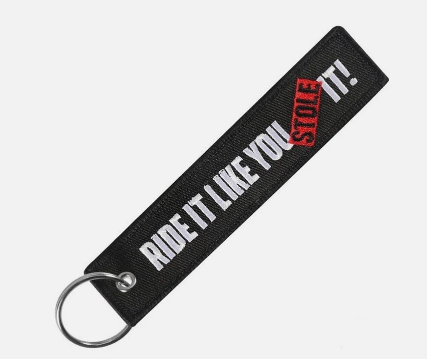 Obesek za ključe "RIDE IT LIKE YOU STOLE IT" jet tag